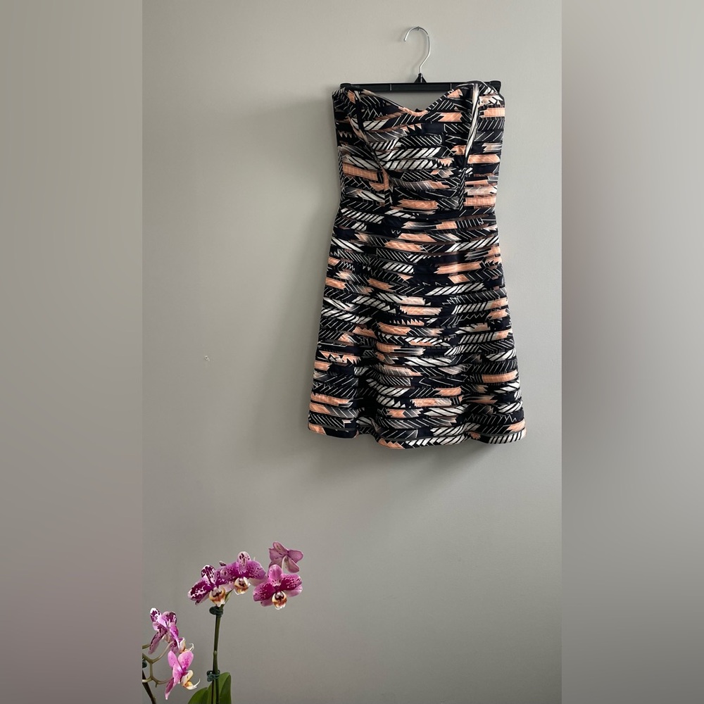 Parker, strapless mini-dress. Black with coral and white stripes/deaign. XS